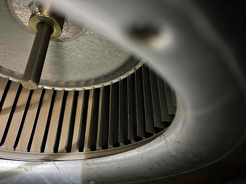 Performed annual prepaid maintenance inspection on furnace under partner plan. Identified several issues including flame sensor with dead spot and high resistance, significant burner corrosion visible on heat exchanger assembly, and accumulated dirt on blower wheel. Presented customer with repair options to address these concerns.