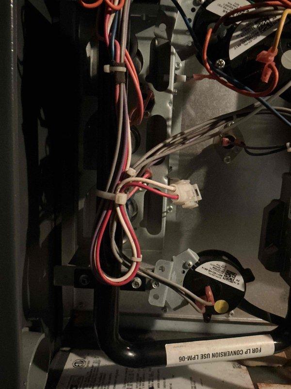 Completed replacement of three burner tubes (10735102S) and flame sensor (0130F00010S) in heating system per maintenance service agreement. Removed burner bar assembly to access components and installed OEM replacement parts. Post-installation testing confirmed proper ignition sequence and flame detection with all three burners showing correct blue flame pattern.