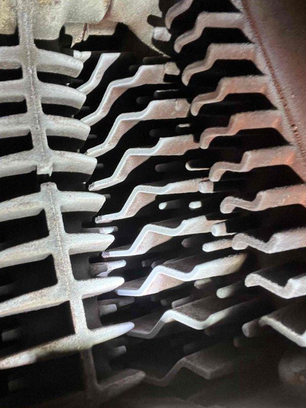 Completed annual prepaid maintenance service on customer's boiler under Partner plan. Inspected heat exchanger fins and internal components. Found manifold pressure set too high at 4"wg and adjusted down to proper specification of 3.5"wg for optimal system performance and efficiency.