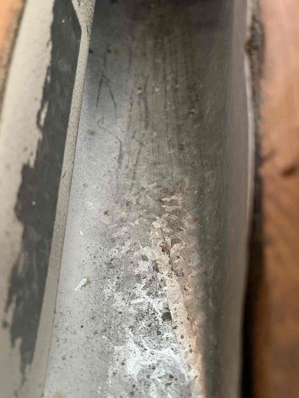 Completed Level 3 duct cleaning service as per customer agreement. Removed accumulated debris and contaminants from ductwork system, addressing visible corrosion and mineral deposits in metal ducts. Service included cleaning of connection points and circular port areas where significant buildup was observed.