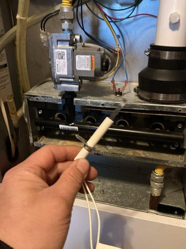 Completed replacement of faulty ignitor with OEM compatible part on customer's furnace. Performed comprehensive testing after installation to verify proper ignition sequence and functionality. System now operating correctly with normal flame sensing and heating performance.