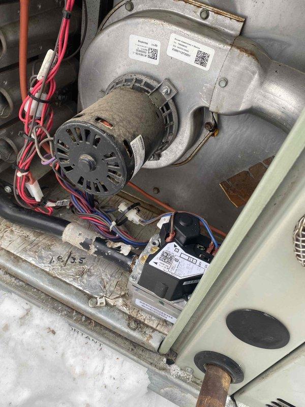 Diagnosed faulty gas valve causing no heat condition on unit under 10 years old. Performed comprehensive testing with EM720 manometer confirming 349 reading outside acceptable parameters. Successfully replaced gas valve and verified proper system operation with all electrical connections to blower motor assembly restored to manufacturer specifications.