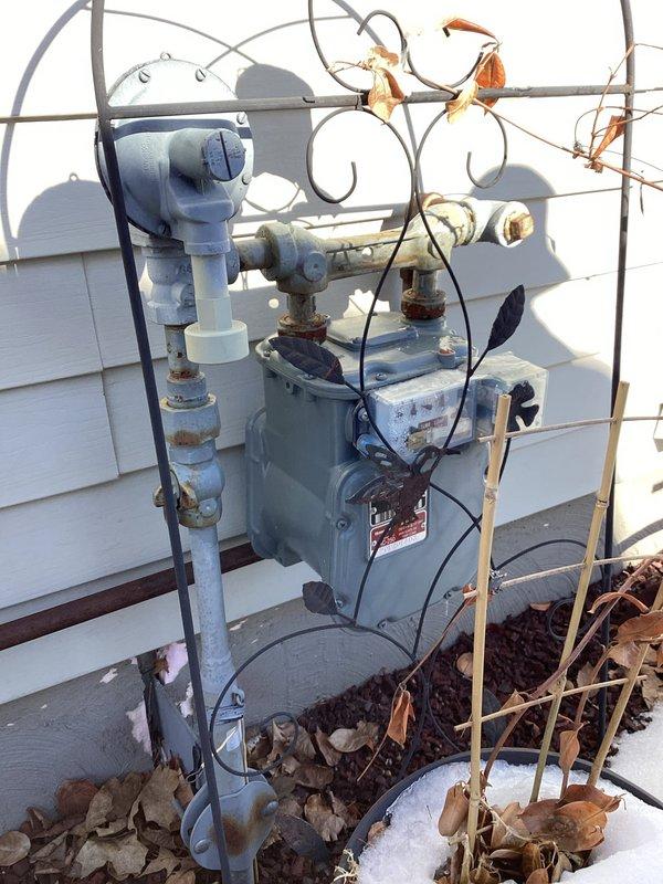 Responded to ongoing furnace performance issues. Consulted with Amana representative to diagnose the problem, determining control board replacement is necessary. Documented gas meter installation showing significant corrosion at connection points and advised homeowner to contact WPS regarding potential gas quality concerns affecting system operation.