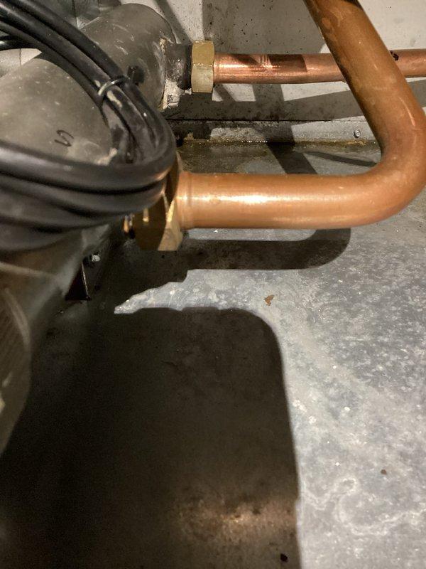 Replaced central heating return pipe in boiler system that had developed a pinhole leak obscured by corrosion. Installed new copper piping with brass fittings and verified proper connection to the existing system. All work completed successfully with no issues.