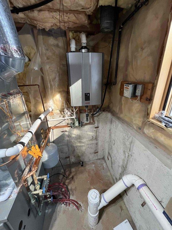 Completed annual boiler inspection in lower level of home, documenting flame sensor and igniter corrosion along with high temperature differential. Documented condition of tankless water heater system and electrical connections. Communicated service options to customer via email.