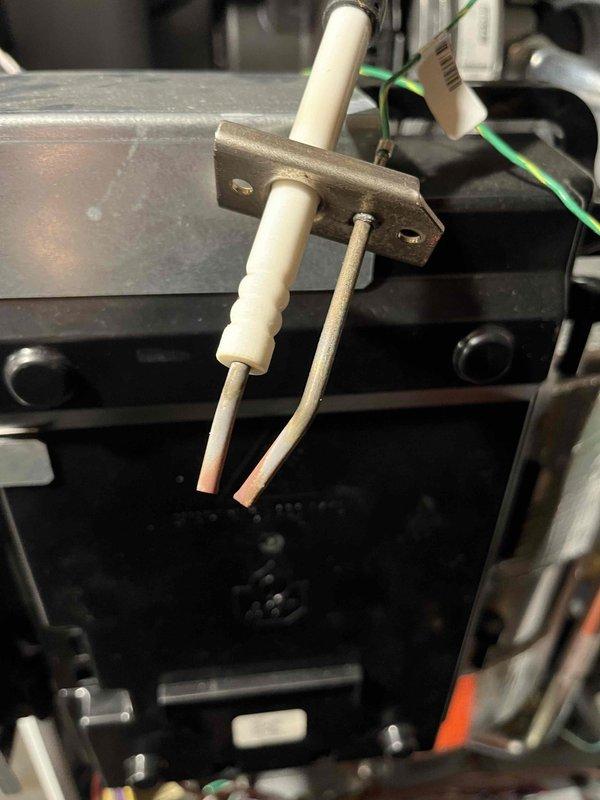 Performed annual maintenance inspection on combination boiler system. Inspected igniter/sensor assembly and verified proper operation. Checked shut-off valves and noted potential moisture damage on adjacent wooden structure, though no immediate service needs were identified at this time.