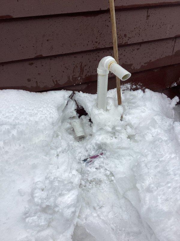 Responded to no heat call for 2-year-old furnace with indoor temperature at 59°F. Diagnostic testing revealed intake ventilation pipe was blocked by snow accumulation. Cleared obstruction and rerouted PVC intake venting to prevent future blockage, restoring proper system operation and heat to the residence.