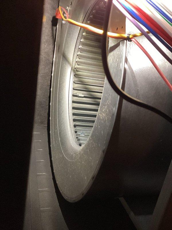 Completed annual preventative maintenance service on gas furnace under prepaid maintenance agreement. Removed and cleaned burner assembly and flame sensor to address corrosion buildup. Inspected blower wheel and electrical connections, documenting condition with photos for service records.