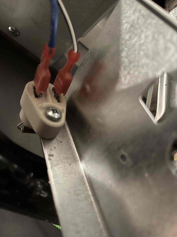 Completed annual prepaid maintenance on furnace under service plan. Found gas manifold pressure at 3.7"wg, exceeding specifications; adjusted down to 3.5"wg per manufacturer requirements. Removed stripped burner chamber access screw by grinding head, completed inspection, and replaced with new fastener upon completion.