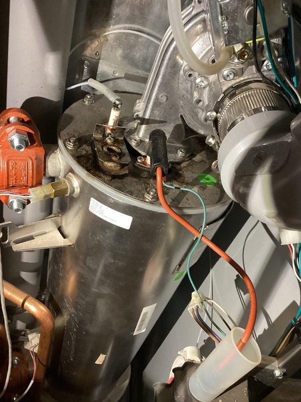 Responded to no-heat call for boiler system. Diagnosed multiple leak points in copper piping causing system pressure loss. Documented evidence of water quality issues affecting the installation; recommended plumber evaluation of water conditioning setup to prevent future leaks.