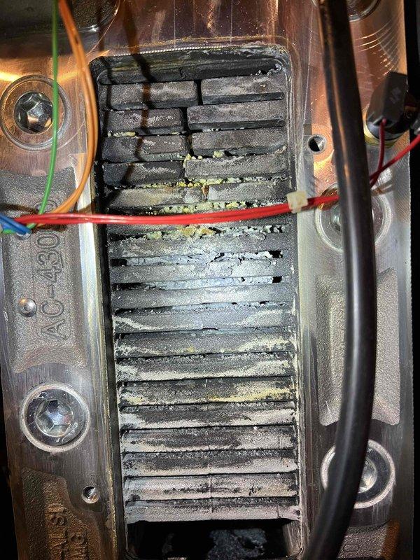 Responded to no heat/hot water callback for recurring issue. Discovered severely sedimented heat exchanger with approximately 90% airflow restriction. Performed thorough cleaning of heat exchanger to restore proper operation and recommended boiler repipe of basement return line to prevent future sediment accumulation.