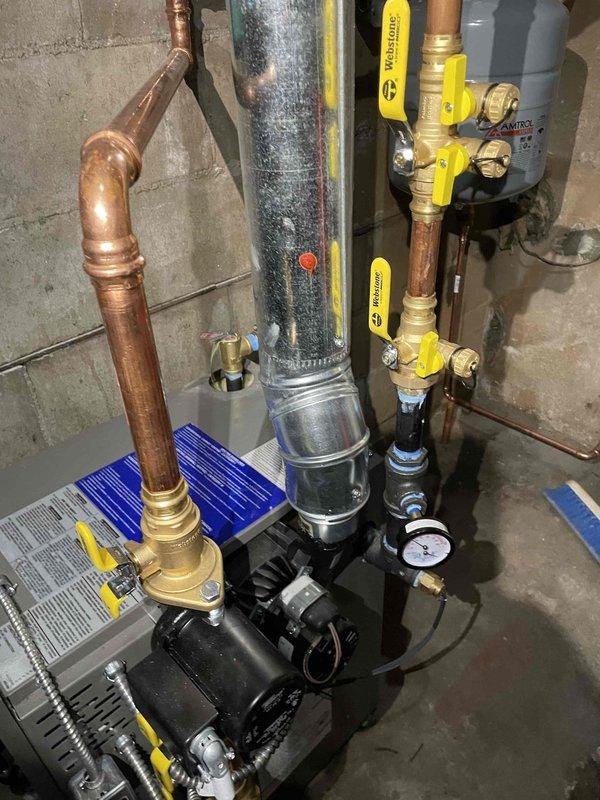 Responded to callback for no heat on recently installed boiler. Discovered pilot assembly was missing the orifice, which was installed during service. Cleaned heat exchanger and verified proper combustion to restore system functionality.