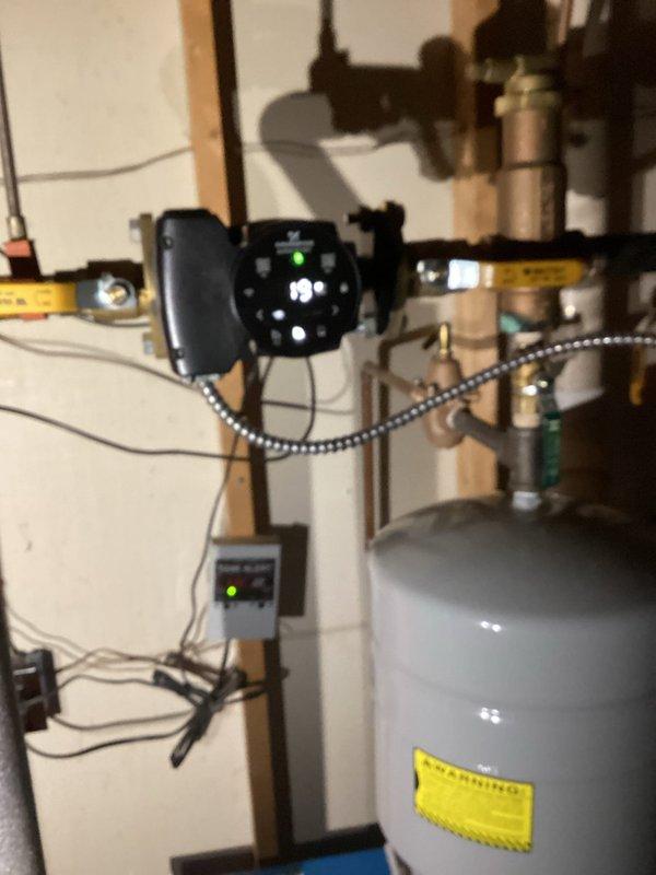 Responded to no heat/hot water call for 15-year-old boiler system. Diagnosed failed circulation pump (IXOS) as primary cause with system temperature reading 44 degrees. Successfully replaced defective pump, restoring proper heating function and hot water service to residence.
