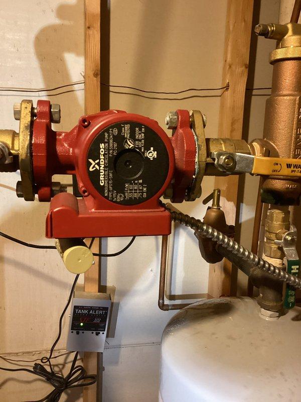 Responded to no heat/hot water call for 15-year-old boiler system. Diagnosed failed circulation pump (IXOS) as primary cause with system temperature reading 44 degrees. Successfully replaced defective pump, restoring proper heating function and hot water service to residence.