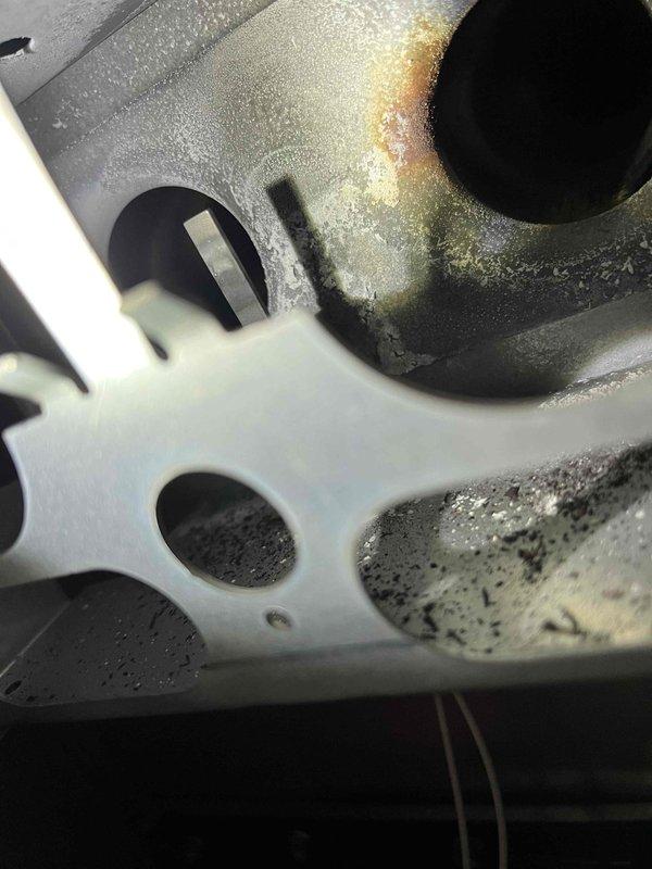 Performed annual furnace maintenance as part of scheduled tune-up service. Identified significant igniter corrosion on the metal assembly and substantial mineral buildup on the humidifier pad/filter element. Both degraded components were replaced to restore proper system operation and efficiency.