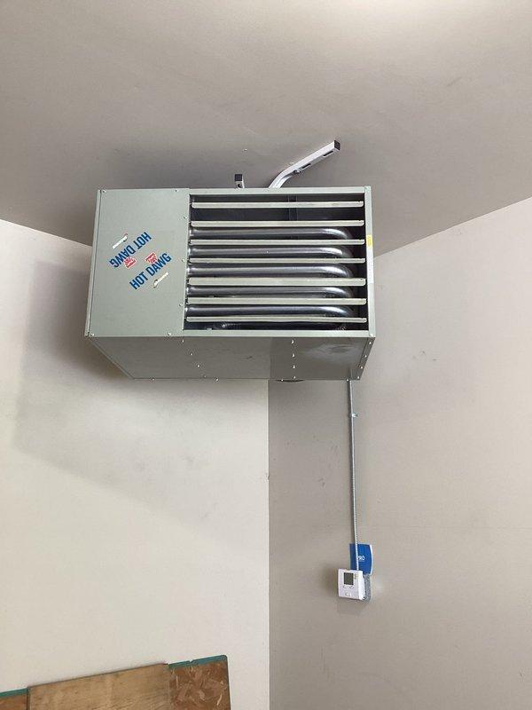 Began replacement of heat exchanger on ceiling-mounted HVAC unit per approved estimate. Inspected ductwork connections and ventilation system, documenting existing conditions with photos. Service was partially completed; technician will return tomorrow to finalize installation and ensure proper functionality of the heating system.