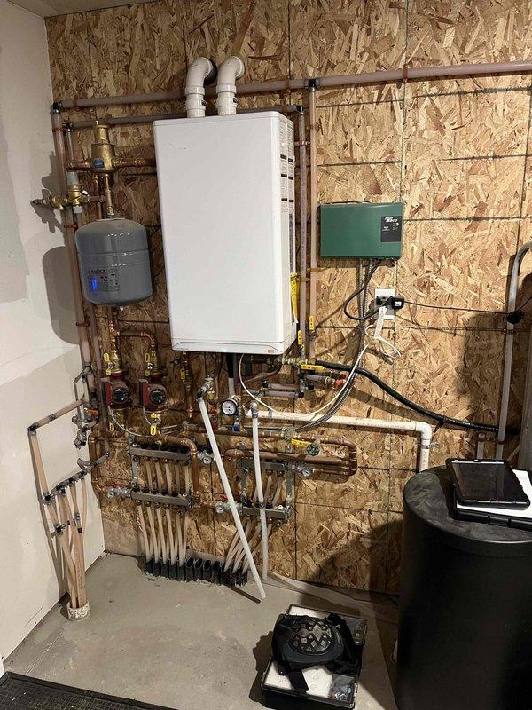Completed annual prepaid maintenance on residential boiler system. Inspected and tested system components including expansion tank, manifold arrangement, and PVC venting. Investigated customer's concern regarding insufficient heating in back bedrooms and bathroom, and provided system upgrade recommendations to address temperature distribution issues.