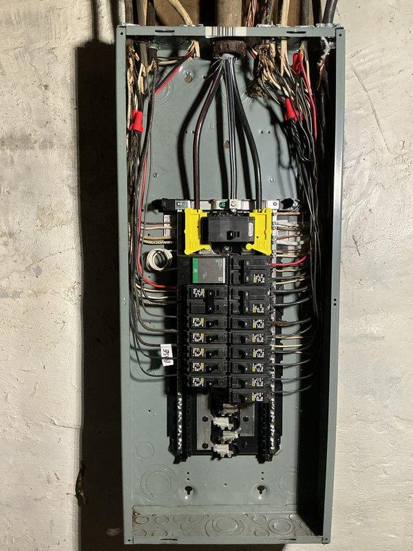 Completed replacement of 100 amp service panel, installing new circuit breakers and properly routing all electrical wiring. Established proper grounding by connecting water line to panel's ground bar in accordance with electrical code. Additionally installed whole home surge protector to safeguard household electronics from power surges.
