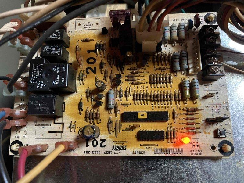 Completed partner plan annual inspection on 15-year-old furnace, identifying multiple issues including flame sensor with dead spots and high resistance, corroded igniters and burners, dirty blower wheel, and discoloration on the control board. Documentation included photographs of the burner assembly showing significant corrosion and the functioning control board for reference. Customer elected to proceed with comfort advisor consultation for replacement options.