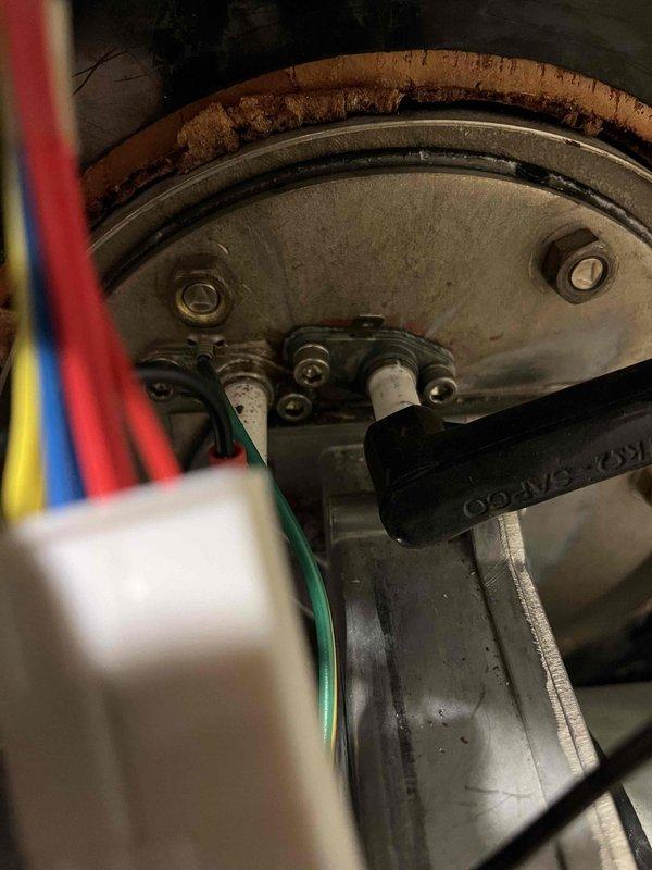Performed annual boiler inspection and identified multiple issues including broken igniter gasket, corrosion on igniter and flame sensor, and elevated carbon monoxide levels during startup combustion. Replaced damaged igniter gasket and provided customer with estimates for recommended repairs of remaining components to restore proper system operation and safety.