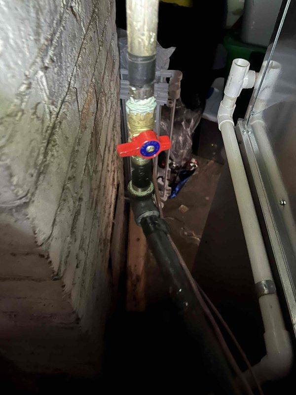 Diagnosed furnace with water accumulation at base and visible mold growth behind unit. Inspection revealed compromised heat exchanger causing water leakage and recommended complete replacement. Documented condensate drainage issues and verified electrical components were operational.