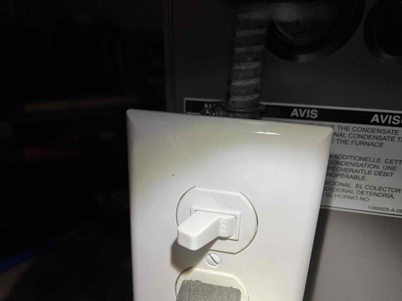 Diagnosed furnace with water accumulation at base and visible mold growth behind unit. Inspection revealed compromised heat exchanger causing water leakage and recommended complete replacement. Documented condensate drainage issues and verified electrical components were operational.