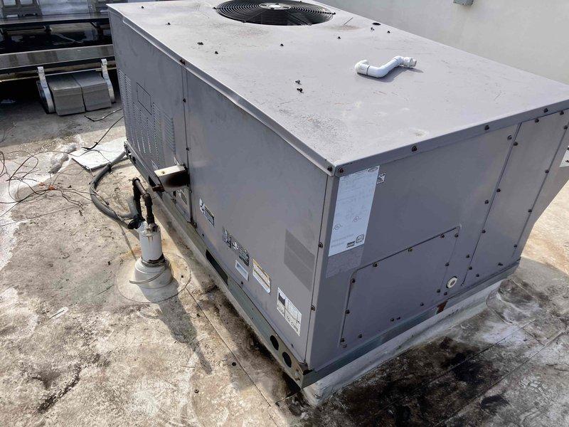 Responded to no-heat call at commercial rooftop unit serving front of house area. Diagnosed issue with thermostat scheduling function interfering with proper operation. Disabled scheduling feature to restore heating functionality. Customer requested installation of three new Wi-Fi compatible thermostats to replace existing units.