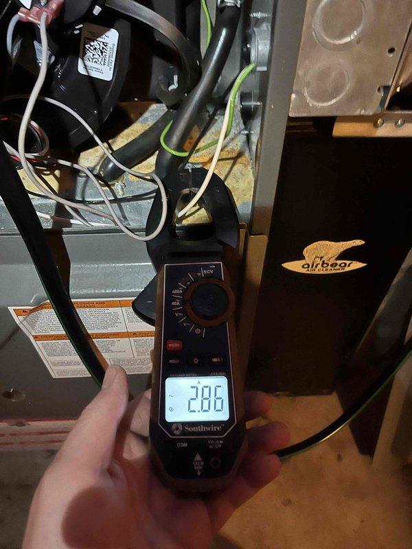 Diagnosed Amana furnace shutdown issue with internal temperature at 59°F. Inspection revealed multiple ignition failures on the control board history, with flame sensor exhibiting a dead spot and soot accumulation on burners. Replaced flame sensor and performed thorough burner cleaning, then verified system operation through multiple successful ignition cycles.