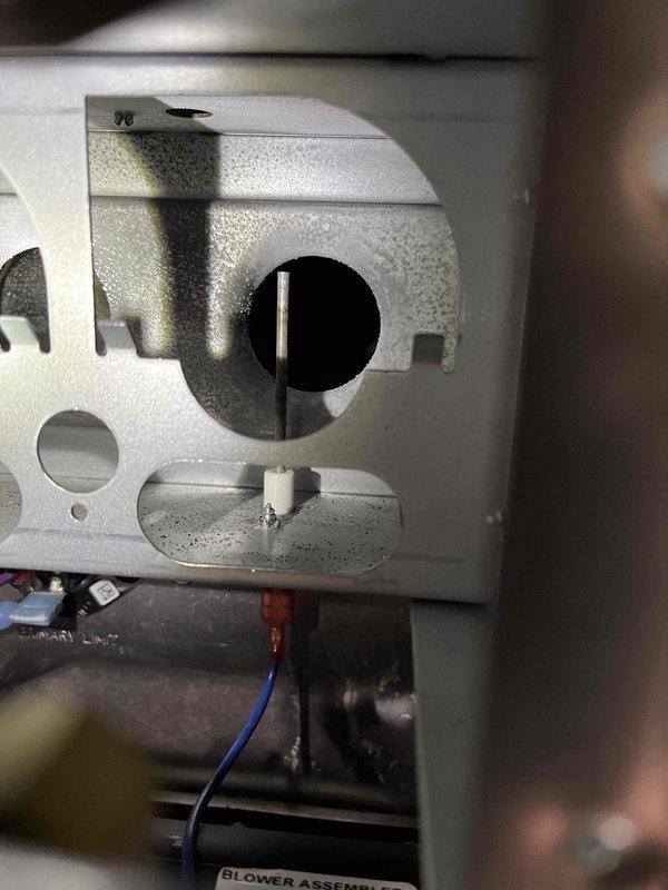 Responded to no heat call where furnace exhibited flame starvation during ignition attempts. Diagnosed issue with gas valve failing to maintain proper fuel supply during startup sequence. Replaced defective gas valve, performed thorough cleaning of all burners, nozzles and flame sensor. Unit successfully completed multiple test cycles with proper ignition and flame retention, restoring normal heating operation to the residence.