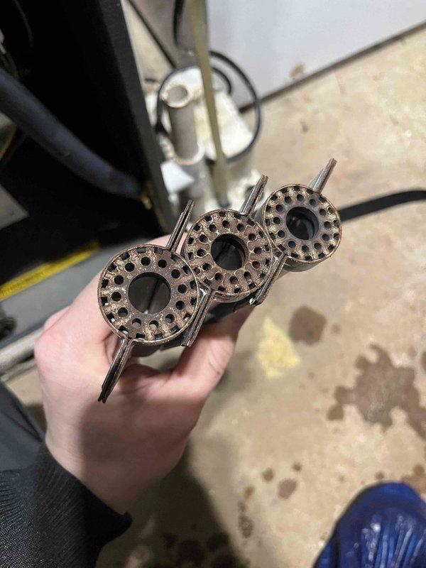 Responded to no heat call where furnace exhibited flame starvation during ignition attempts. Diagnosed issue with gas valve failing to maintain proper fuel supply during startup sequence. Replaced defective gas valve, performed thorough cleaning of all burners, nozzles and flame sensor. Unit successfully completed multiple test cycles with proper ignition and flame retention, restoring normal heating operation to the residence.