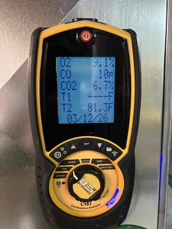 Performed annual furnace maintenance including combustion analysis with readings of 9.1% O2, 10 PPM CO, and 6.7% CO2. Inspected blower assembly which showed normal dust accumulation. Replaced dirty air filter to restore proper airflow and system efficiency.
