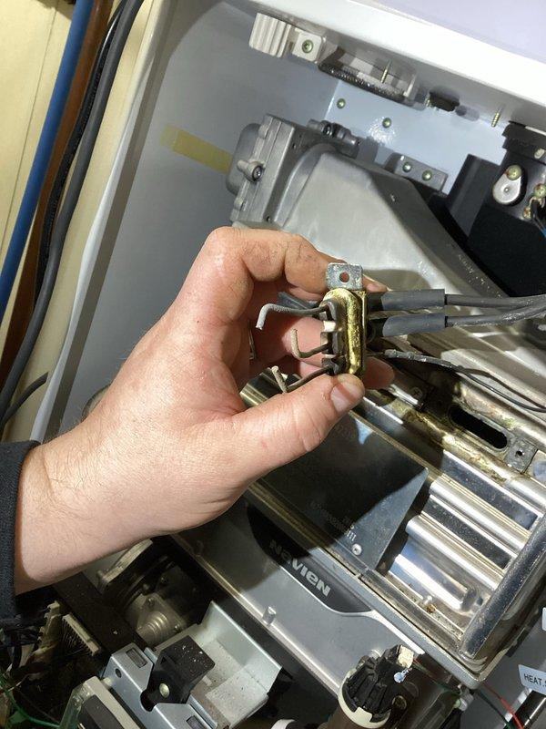 Responded to no-heat call on Navien boiler system. Diagnosed gas leak at the venturi assembly. Inspected internal components and identified defective gas connection requiring replacement parts. Customer advised of findings and awaiting approval on repair estimate.