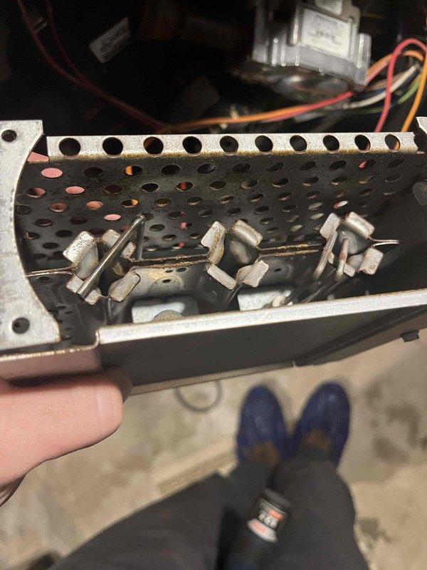 Performed diagnostic service on 20+ year old furnace with no heat issue. Found dirty flame sensor, igniter, and burners causing ignition failure; also identified inducer drawing high current and capacitors out of specification range. Completed thorough cleaning of flame sensor, burners, and igniter which restored proper heating function; provided estimates for replacement of inducer motor and capacitors.