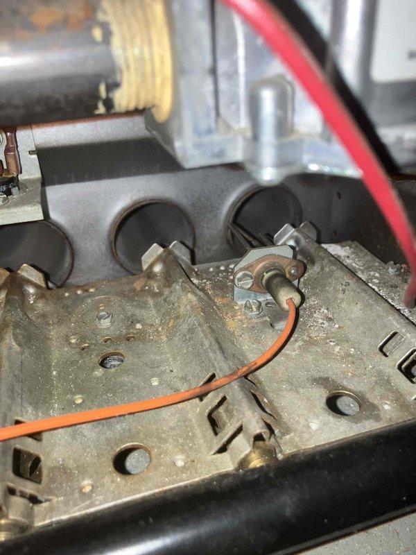 Responded to no heat call for 18-20 year old Rheem furnace blowing cold air. Diagnostic inspection revealed cracked heat exchanger, which presents safety hazard and explains cold air output. Recommended immediate replacement of unit due to age and condition of critical components.