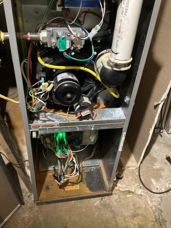 Diagnosed and repaired 7-year-old natural gas furnace with overheating condition. Cleaned secondary heat exchanger and reinstalled furnace properly to restore normal heating operation. System now functioning within manufacturer specifications with proper airflow and temperature rise.