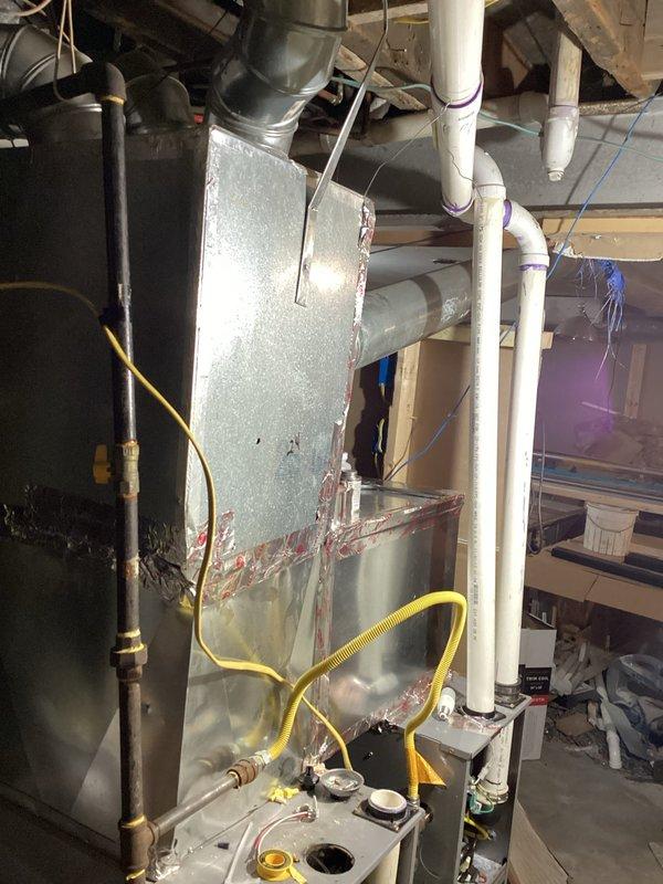 Diagnosed and repaired 7-year-old natural gas furnace with overheating condition. Cleaned secondary heat exchanger and reinstalled furnace properly to restore normal heating operation. System now functioning within manufacturer specifications with proper airflow and temperature rise.