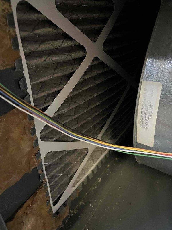 Performed annual inspection on 17-year-old furnace and addressed non-functioning humidifier. Found humidifier pad installed incorrectly, repaired torn internal water line, and replaced flame sensor exhibiting high resistance and dead spots. Service included system evaluation, filter inspection, and recommendation of preventative maintenance options due to aging blower motor.