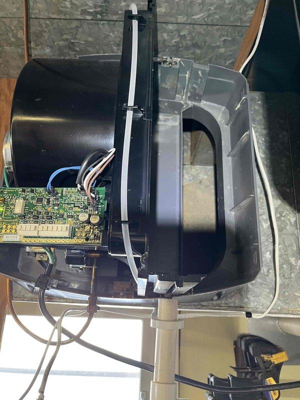 Performed annual inspection on 17-year-old furnace and addressed non-functioning humidifier. Found humidifier pad installed incorrectly, repaired torn internal water line, and replaced flame sensor exhibiting high resistance and dead spots. Service included system evaluation, filter inspection, and recommendation of preventative maintenance options due to aging blower motor.