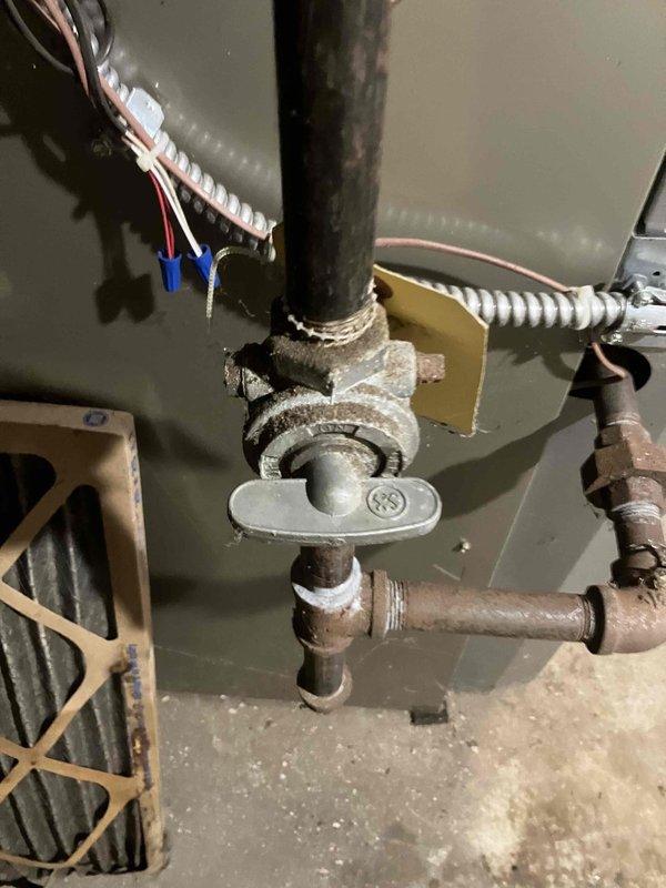 Diagnosed 2008 furnace with no heat complaint; found failed inducer motor and compromised heat exchanger. Performed safety inspection, verified gas valve and electrical switch functionality, and recommended immediate replacement due to critical safety concerns.