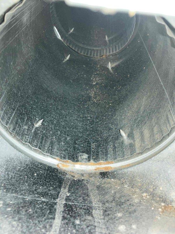 # Service Report: Duct Cleaning

Performed comprehensive duct cleaning service at recently purchased cabin property. Inspection revealed significant dust and debris accumulation throughout the HVAC system, including heavy buildup on blower wheel assembly and interior ductwork surfaces. Successfully cleaned all accessible ductwork, blower components, and system openings using professional duct cleaning equipment, removing accumulated particulates and restoring proper airflow pathways to ensure optimal system performance.