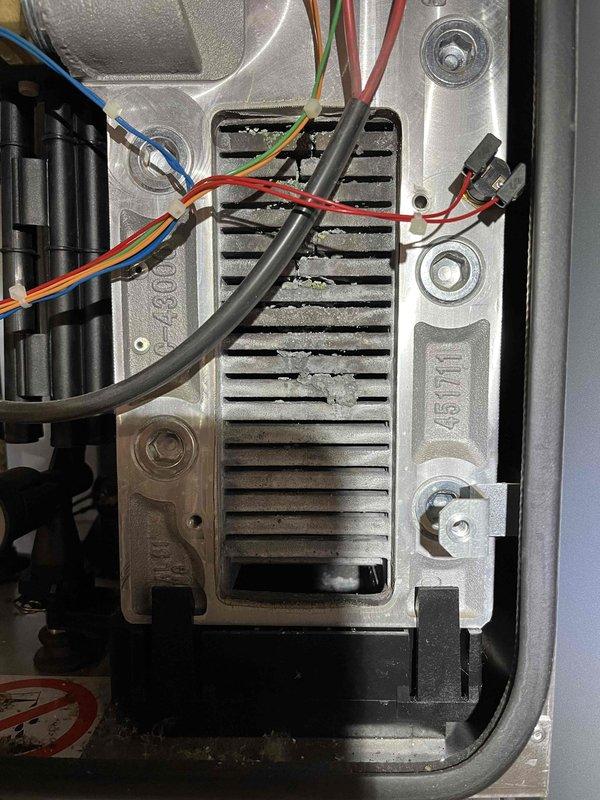 Completed annual prepaid maintenance inspection on boiler system. During inspection, identified active leak on condensate discharge line. Repaired leak by replacing damaged section of discharge line using customer-provided hose and barbed fitting to restore proper condensate drainage and prevent water damage.