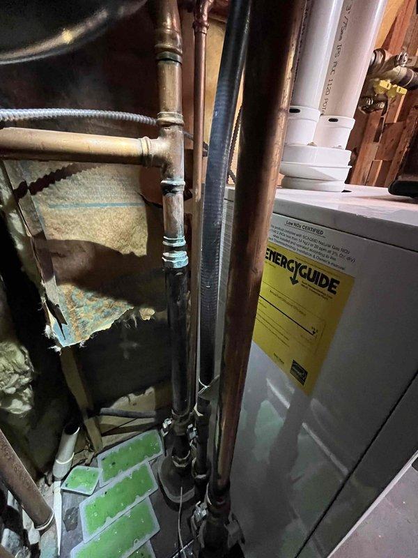 Performed comprehensive inspection of boiler system and identified multiple corroded pipe fittings throughout the installation, likely caused by antifreeze degradation in the heating system. Provided detailed estimates for complete repiping of affected boiler connections and reconnection of drop zone to restore proper system operation. Assisted with troubleshooting wireless connectivity issues on zone control system and documented existing conditions with photographs showing deteriorated brass fittings on copper piping and compromised mechanical connections in utility space.