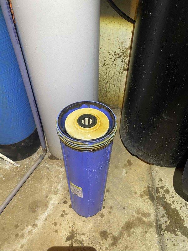 Completed annual prepaid maintenance inspection on water conditioning system, including acid neutralizer, water softener, and filtration components. Identified multiple issues affecting system performance across all three units: acid neutralizer showing signs of media depletion and potential control valve malfunction, water softener exhibiting brine tank irregularities and resin bed concerns, and filter housing displaying wear on seals and mounting hardware. Documented all equipment conditions with photographs and provided comprehensive estimates for both repair options and full replacement considerations to restore proper water treatment functionality.