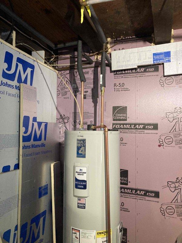 Completed de-winterization service for single-bathroom cottage facility. Restored water heater to operational status, opened main water supply lines, verified proper function of copper piping system and brass valve connections, and confirmed all plumbing systems operational for seasonal use.