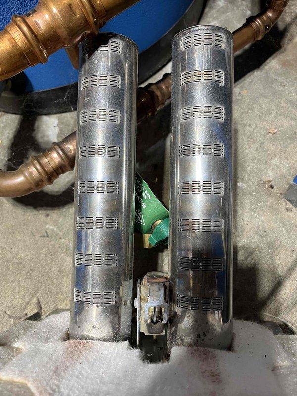 Completed annual maintenance inspection on 16-year-old boiler system. Identified slight corrosion on pilot assembly and dirty burner components. Thoroughly cleaned all affected parts and restored system to proper operating condition. Discussed preventative maintenance options and replacement considerations given the age of the equipment.