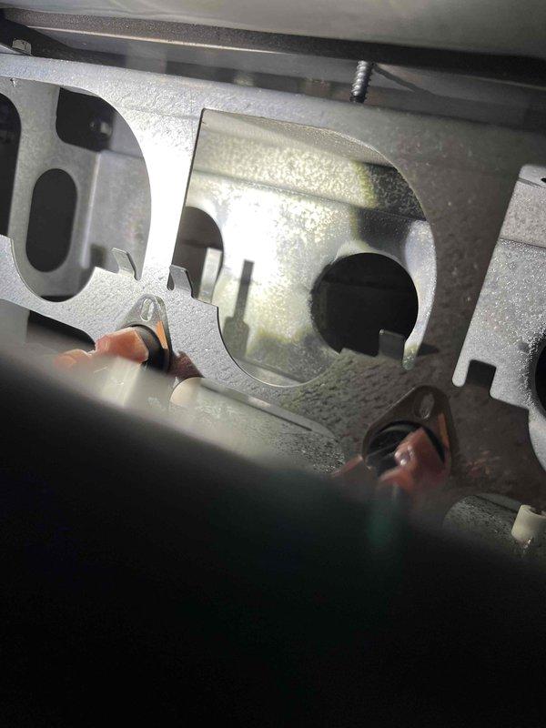 Performed annual furnace inspection and tune-up on system that had never been previously serviced. Removed and thoroughly cleaned heavily soiled burner assembly showing significant carbon and soot buildup. Cleaned evaporator coil which exhibited substantial frost accumulation, inspected all internal components, and provided equipment replacement recommendations based on system age and condition.