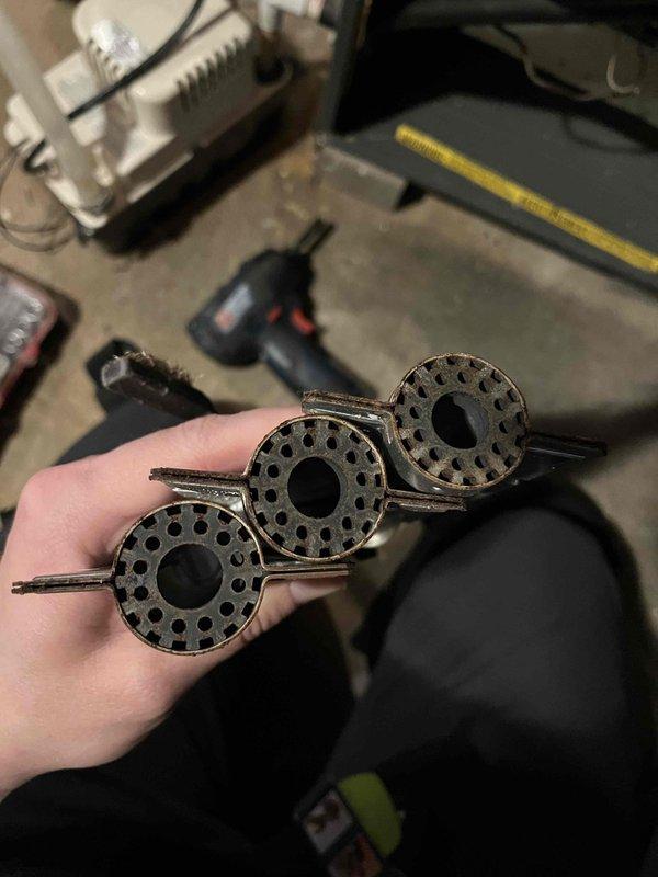 Performed annual furnace inspection and tune-up on system that had never been previously serviced. Removed and thoroughly cleaned heavily soiled burner assembly showing significant carbon and soot buildup. Cleaned evaporator coil which exhibited substantial frost accumulation, inspected all internal components, and provided equipment replacement recommendations based on system age and condition.