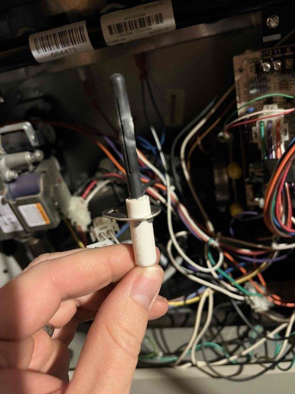 Responded to emergency no heat call for 1980s-era furnace. Upon inspection, found significant corrosion on flame sensor, igniter, and transformer components preventing proper system operation. Removed and cleaned corroded flame sensor, inspected igniter assembly and transformer for functionality. Due to age of equipment and extent of corrosion on multiple critical components, recommended comfort advisor consultation for replacement options given the unit's 40+ year service life and deteriorating condition of ignition and safety systems.