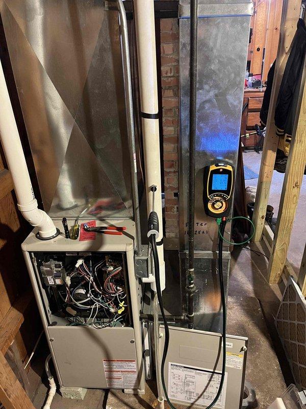 Responded to emergency no heat call for 1980s-era furnace. Upon inspection, found significant corrosion on flame sensor, igniter, and transformer components preventing proper system operation. Removed and cleaned corroded flame sensor, inspected igniter assembly and transformer for functionality. Due to age of equipment and extent of corrosion on multiple critical components, recommended comfort advisor consultation for replacement options given the unit's 40+ year service life and deteriorating condition of ignition and safety systems.