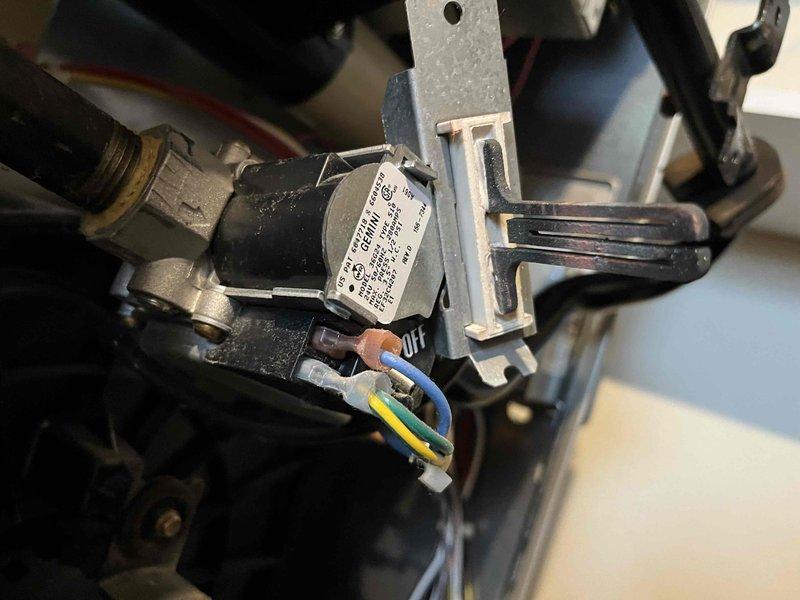 Responded to emergency no heat call on 20-year-old gas furnace system. Upon inspection, discovered cracked hot surface igniter preventing burner assembly ignition. Removed failed igniter from burner assembly, installed new replacement igniter, and verified proper electrical connections. Tested system operation through complete heating cycle, confirmed ignition sequence functioning correctly and all burners lighting properly. System restored to full operational status. Discussed system replacement options with homeowner due to age of equipment.